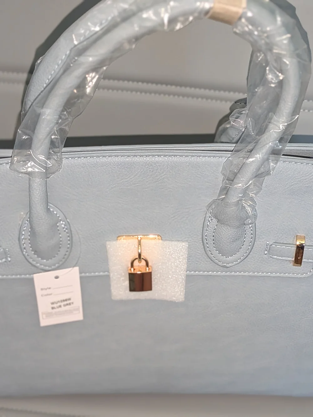 Elegant Women's Top-Handle Bag in Light Blue with Gold Hardware
